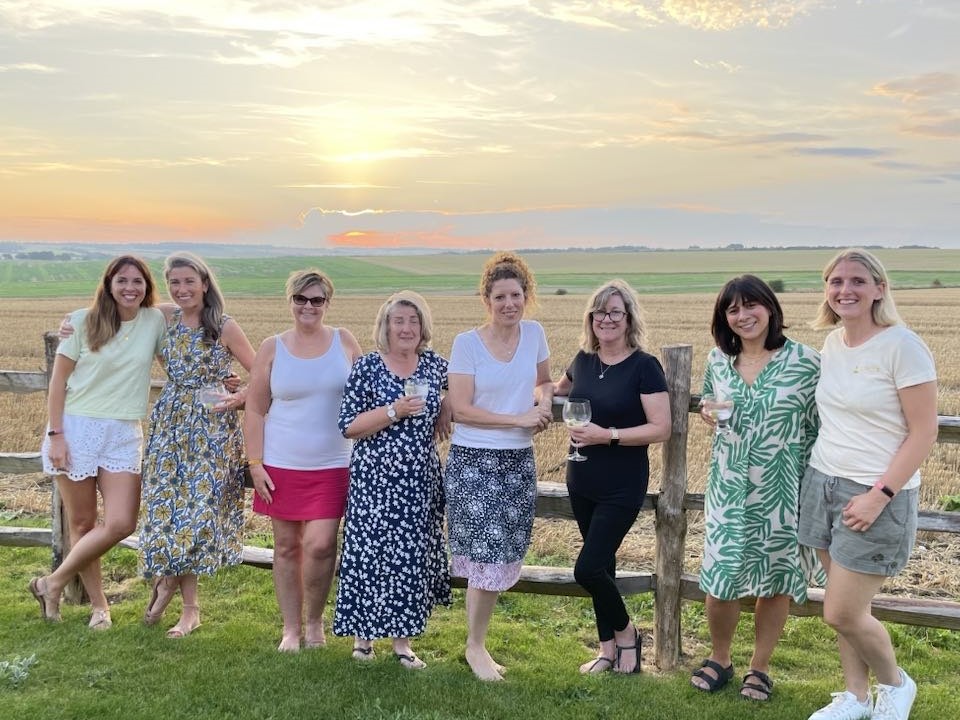 women outside at sunset